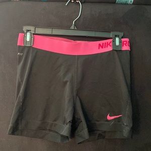 Plain black with pink waist band Nike pros